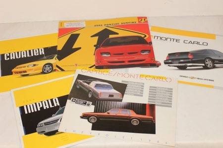 5 Assorted Car Brochures