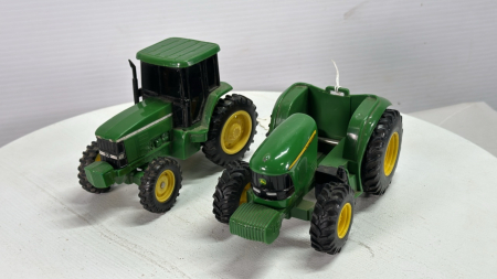 (2) Plastic John Deere Tractors