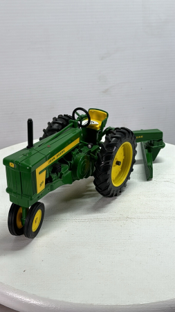 John Deere 720 Tractor with Scraper Blade