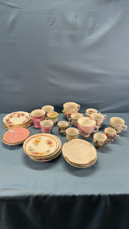 Quantity of Small Tea Cups & Misc. Saucers