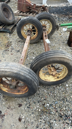 Pair of steel axles with tires