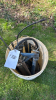 Pail of Grease and Caulking Guns