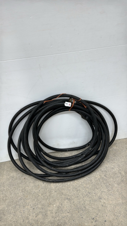 Roll of Black Rubber Garden Hose