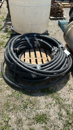 LARGE ROLL OF 1 1/4IN BLACK POLY PIPE