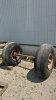 AXLE WITH (2) AIRPLANE TIRES