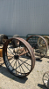 PAIR OF 50IN STEEL WHEELS ON 5FT 7IN LONG AXLE