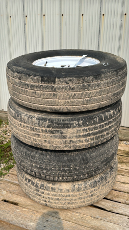 SET OF 4 235/85R16 TIRES ON 8-BOLT RIMS