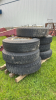 (7) 10.00-20 TIRES ON OPEN CENTER RIMS - 2