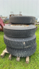 (7) 10.00-20 TIRES ON OPEN CENTER RIMS - 3