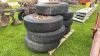 (7) 10.00-20 TIRES ON OPEN CENTER RIMS - 6