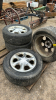 4 Firestone P235/60R16 on 5 Bolt Chrome Rims - 4