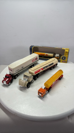 (4) Semi's w/Plastic Trailers