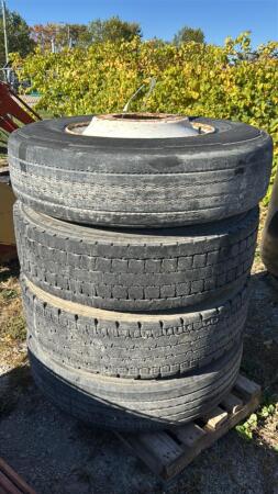 4- 11R22.5 TIRES ON STEEL 10-BOLT RIMS