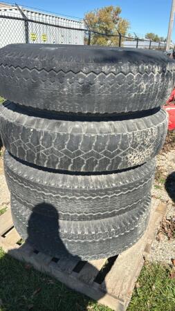 LOT OF 4 - 10.00-20 TIRES ON RIMS