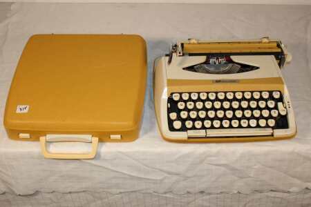 Vintage Portable Typewriter In Case