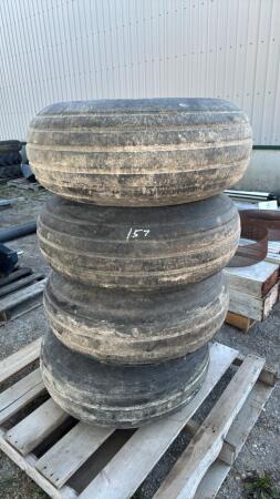 (4) GOODYEAR 12.5L-15SL TIRES ON 8 BOLT RIMS