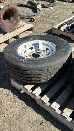GOODYEAR LT235/85R16 TIRE ON 8 BOLT RIM