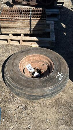 GOODYEAR IMPLEMENT TIRE 9.5L-14SL ON 6 BOLT RIM