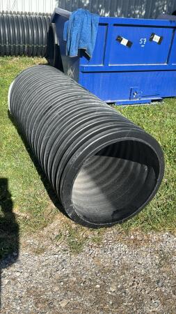 PIECE OF POLY PIPE 20IN X 5FT