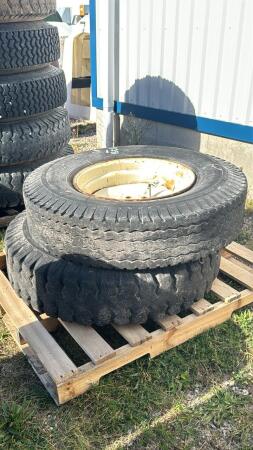 (2) 10.00-20 TIRES ON 8 BOLT RIMS