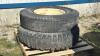 (2) 10.00-20 TIRES ON 8 BOLT RIMS - 2