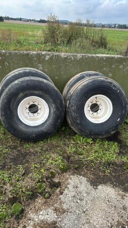 Lot of 4 - 16.5L-16.1SL Tires and 8-Bolt Rims