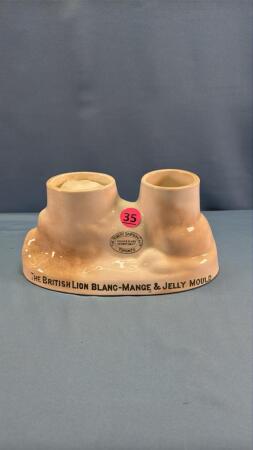 SIMPSON'S BRITISH LION PORCELAIN JELLY MOLD