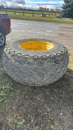 FIRESTONE 30.5L-32 TIRE ON 10-BOLT RIM