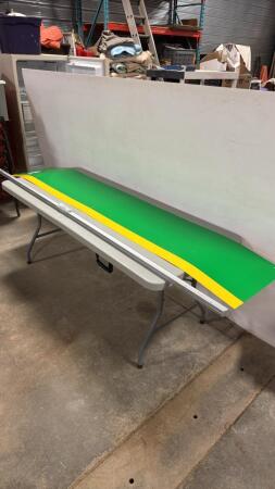 PLASTIC JOHN DEERE SIGN WITH METAL FRAME