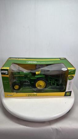 JOHN DEERE 2010 TRACTOR WITH DISC