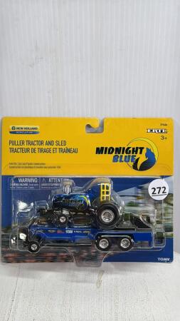 NEW HOLLAND PULLER TRACTOR & SLED