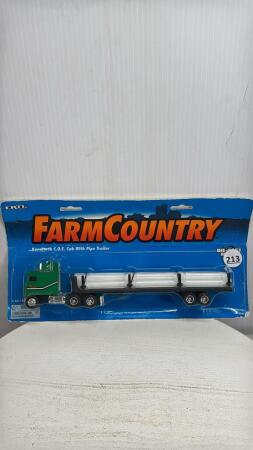 KENWORTH SEMI WITH PIPE TRAILER