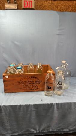 WOODEN CRATE WITH MILK BOTTLES