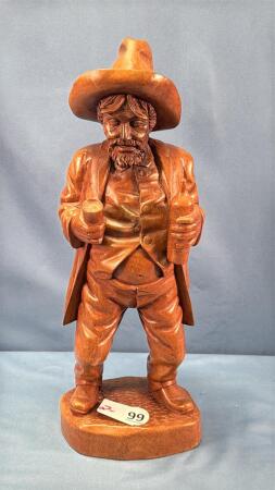 CARVED WOODEN COWBOY