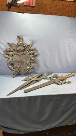 METAL COAT OF ARMS & (3) METAL SWORDS