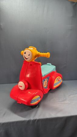 FISHER PRICE RIDE ON TOY CAR