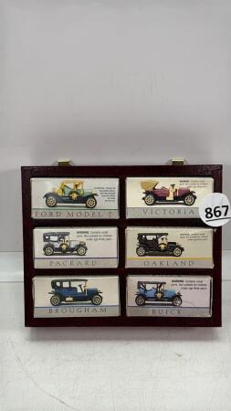 WOODEN SHELF WITH (6) OLD CARS IN BOXES