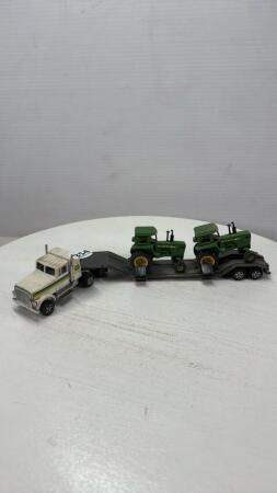 JOHN DEERE SEMI WITH 2 JOHN DEERE TRACTORS