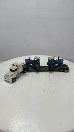 FORD NEW HOLLAND SEMI WITH 2 FORD TW-35 TRACTORS