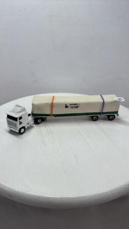 CUSTOM MACK SEMI HAULING HAY