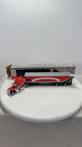 FEATHERLITE DROP BED TRAILER W/PETERBILT 379 SEMI