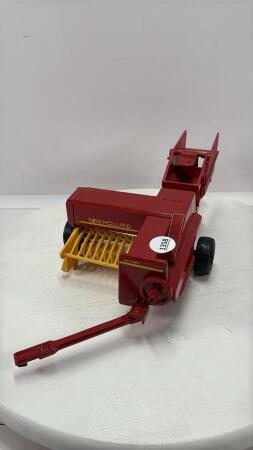 NEW HOLLAND SMALL SQUARE BALER WITH THROWER