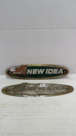 (2) NEW IDEA TIN OVAL SIGNS