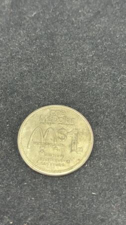 MCDONALDS ONE DOLLAR COIN