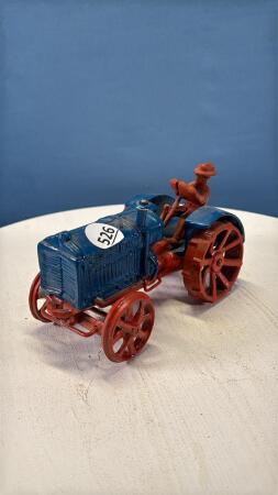 CAST IRON MCCORMICK DEERING WITH MAN
