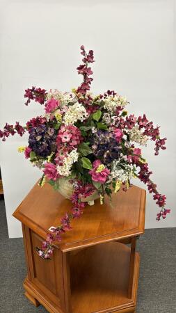 POTTERY FLOWER POT WITH FLORAL ARRANGMENT