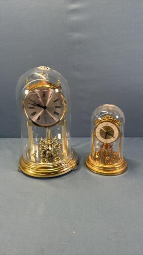 (2) ANNIVERSARY CLOCKS