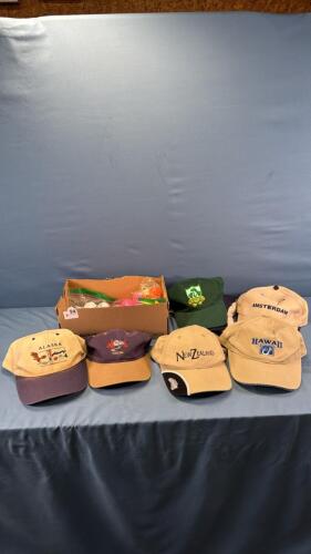 APPROX. 30 GOLF BALLS & (7) TOURIST CAPS