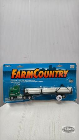 KENWORTH WITH PIPE TRAILER