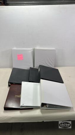 (8) BINDERS WITH CLEAR SLEEVES
